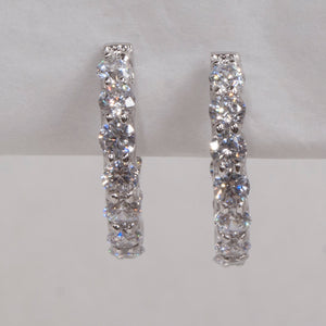 Sterling Silver Cubic Zirconia Huggie Hoop Earrings by Miss Mimi