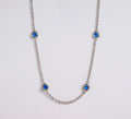Sterling Silver Station Necklace with Synthetic Saphire by Miss Mimi