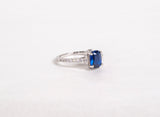Sterling Silver Ring with Cubic Zirconia and Emerald Cut Synthetic Sapphire by Miss Mimi